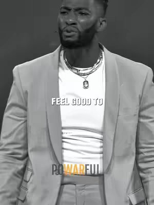 A grayscale image features a Black man in a suit and white t-shirt providing a motivational and spiritual pose. Text overlays that read "FEEL GOOD TO" is at the center of the frame. At the bottom is the word POWERFUL