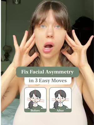 The cover image is a medium shot of a woman with long, brown hair and bright, blue eyes. She's in the middle of a face yoga pose, using her hands to pull at her temples while her mouth forms a wide "O." The background appears to be a room with a light-green wall and hints of a black object in the background, adding depth. A light-pink tank top, and the clear lighting enhances the brightness of the image. The text overlay, 'Fix Facial Asymmetry in 3 Easy Moves' sits over the action, with a Before & After graphic in a lower box