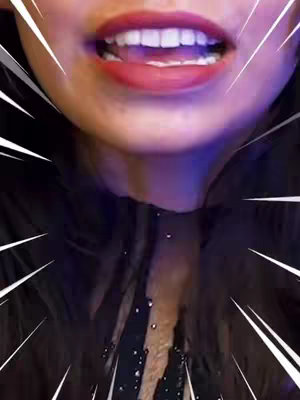 A close-up shows a woman's mouth open in an excited expression. The background is a blur of purple and black, with white lines radiating outward, suggesting energy or emphasis.