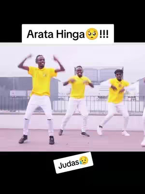 The cover image features a group of four young men dancing on what appears to be a rooftop. The men are wearing matching yellow shirts, white pants, and dark shoes. They are against a backdrop of a cityscape setting. Text overlays include a title and a label to the bottom left.