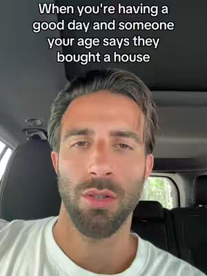 A selfie-style video with a man in the front seat of a car. The man is centered in the frame, and the background shows the interior of a vehicle, possibly a car. Text is overlaid on the image, and the man stares directly at the camera.