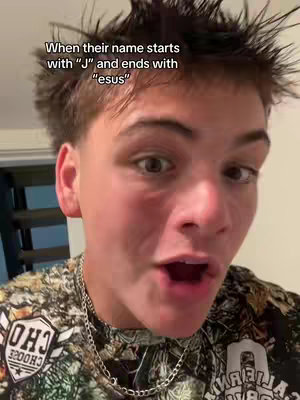 A close-up shot of a young person with short, spiky hair. They are looking directly at the camera with a surprised expression, mouth open as if speaking. The person is wearing a camo-patterned shirt. Overlaid on top is white text.