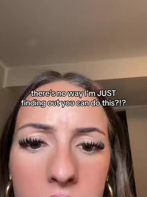 A close-up shot features a young woman's face, framed from the forehead down. She's looking towards the camera with a surprised expression. Above her are the words 'there's no way I'm JUST finding out you can do this?!' in a semi-transparent white text box.