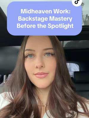 A selfie-style shot featuring a young woman with long, wavy brown hair and light skin sits inside a car. She looks directly at the camera. A text overlay in a light blue box sits above her head, and there. The background is blurred, with a car interior visible behind her.