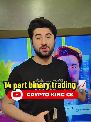 A man with dark hair and a beard stands in front of a television screen and a background, holding a phone while the video overlay announces the release of a 14-part series on binary trading.