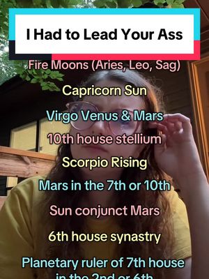 The cover image is a vertical shot of a person's face, centered, with text overlays. The person is wearing glasses and looking at the camera with a slightly concerned expression. The background is blurred, but appears to be a natural outdoor setting. The text overlays are in different font colors and sizes, listing astrological information and are arranged on top of the person's face.