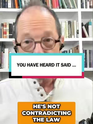 A man with glasses is the central figure, seen from the chest up. The background is a bookshelf filled with books, creating a scholarly atmosphere. Overlay text is layered in the middle and at the top of his chest