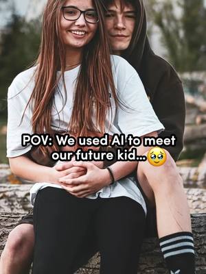 A cover image featuring a young couple embracing outdoors. The woman, with long brown hair and glasses, is in the foreground, smiling directly at the camera. The man with short hair is behind her, holding her, also looking at the camera. The background blurred image of brown log.