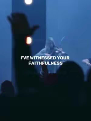 The image features a stage with a spotlight highlighting a musician playing a violin prominently and several out-of-focus figures in the foreground, likely an audience. Text overlayed on the image reads, 'I'VE WITNESSED YOUR FAITHFULNESS,' set against a dark, atmospheric backdrop.