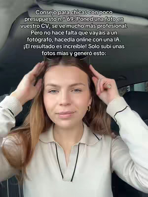 A woman with long, light brown hair is shown in a medium shot, with the focus on her face and upper body. Her hands are raised, touching her head with her index fingers. Behind her is a blurred background, possibly of a car interior. Text overlays on the image. She's wearing a cream-colored collared shirt.