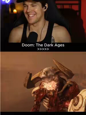 The cover image is split into two sections. The top half features a smiling man wearing a black tank top and a black cap, seemingly in a gaming setup, looking directly at the camera. The bottom half of the image shows a creature from the video game Doom, a grotesque demon with large horns, exposed flesh and glowing elements, set against a reddish-brown background.