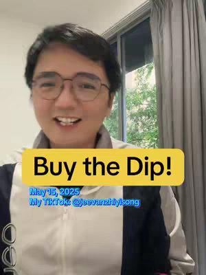 A man with glasses smiles, set against an interior background with a window and curtains. A yellow rectangular text box overlay reads: "Buy the Dip!" with additional text indicating a date and TikTok handle.