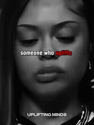 A close-up, black and white portrait of a person with dark hair, the face is framed by the shoulders. Black and white text overlays say the text: "someone who uplifts" where the word uplifts is in red color, there is also text that says: "UPLIFTING MINDS".
