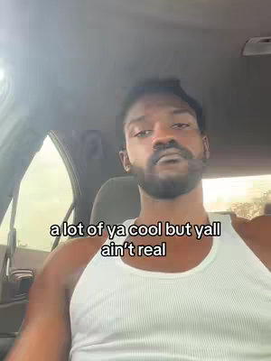 A selfie-style video taken from inside a car. The primary focus is a man with a beard and a serious facial expression. The man is wearing a white tank top. The hook text is overlaid on top of the image.