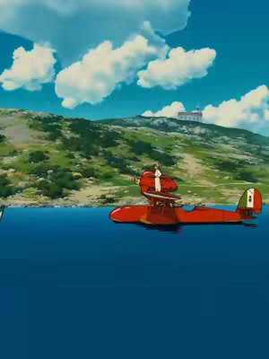 An animated scene featuring a red seaplane with a figure standing on top, flying over blue water. The background includes a grassy hill with a building and a bright blue sky filled with fluffy white clouds.