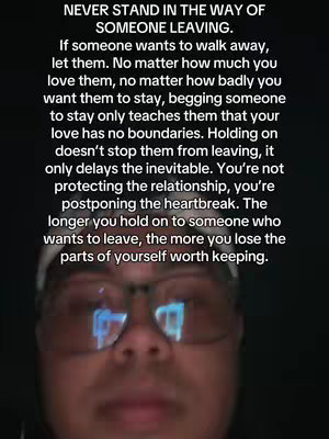 A selfie-style shot featuring a man with glasses against a dark background. The man appears to be in his 20s-30s with short, dark hair. The text are words over the image which are written by a sans-serif font, the text is centered.