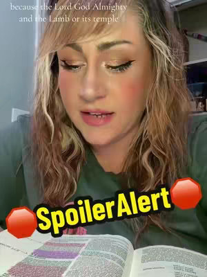A woman with long wavy hair, wearing a green t-shirt, is holding and reading a book. The cover image has a text overlay that says 'Spoiler Alert' in a yellow font, placed on top of two red octagon shapes.