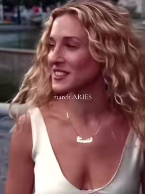 The cover image shows a woman with blonde, wavy hair, and a white top. She is angled to the side and has a slight smile. The text overlay on the image reads 'march ARIES.'