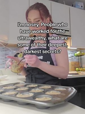 A woman stands in a kitchen, holding a clear measuring cup with a dark mixture, possibly batter or sauce, pouring it into a muffin tin. The background features a well-lit kitchen with white cabinets. The woman wears a light purple top and a black apron. Text overlays articulate a question.