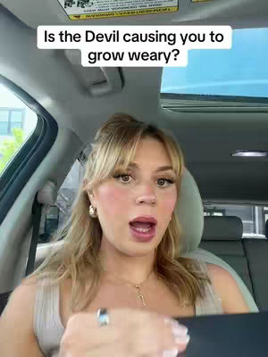 The cover image shows a woman inside a car, looking at the camera with an open mouth, as if she's speaking. Text overlayed on top asks 'Is the Devil causing you to grow weary?'. The background includes the car's interior, including a sunroof.