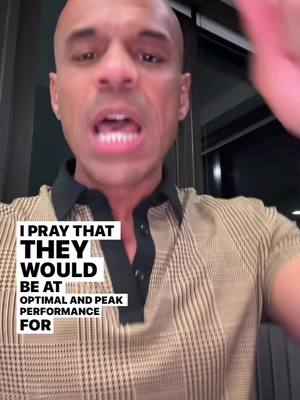 The cover image features a man with a shaved head, open mouth, and raised hand. He's wearing a plaid shirt with a solid collar. Text overlays are positioned at the bottom of the frame over a dark background.