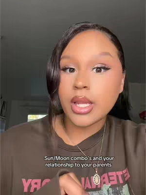 A woman with dark hair and makeup looks directly at the camera, framed from the chest up. Text overlays the bottom center area of the image.