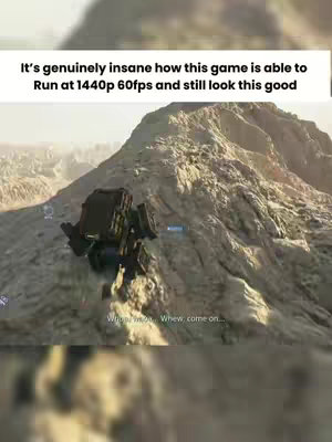 A video game scene with a mechanical figure on a rocky mountain, with text overlayed at the top.