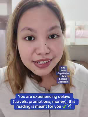 A woman with light brown hair and a white shirt is centered in the frame. She's looking directly at the camera with a slight smile. The background is a bit blurred, with a peek of a pink bed visible. On the right side, there's a small text box listing zodiac signs: Leo, Aries, Sagittarius, Libra, Scorpio, and Capricorn. A blue rectangle below the woman contains the video's hook text.