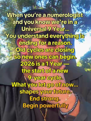 The cover image shows a person with text overlay.  The figure is in front of greenery, angled toward the camera, wearing a dark jacket and sunglasses. Text in a yellow font describes the year and spiritual concepts.