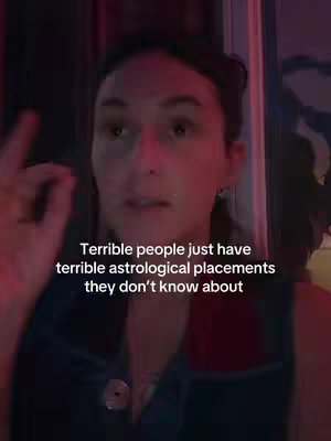 The cover image features a woman with dark hair, looking at the camera and speaking. Text overlayed on the image reads, \"Terrible people just have terrible astrological placements they don't know about.\" The shot is lit with reddish tones.