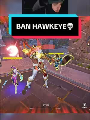 The cover image shows a streamer in the top area, and underneath a game screenshot with two characters displayed. The game screenshot shows a character in the middle with a weapon, surrounded by a battlefield. The background is abstract with futuristic shapes.