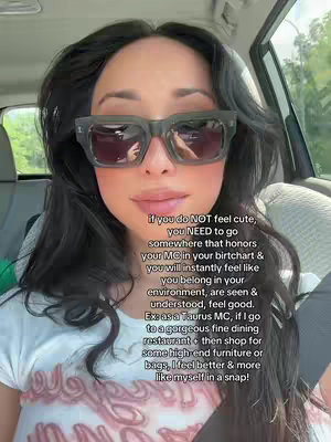 A selfie taken from inside a car, featuring a woman with dark hair wearing large, square sunglasses. The background is slightly blurred, showing the interior of the car and some greenery. Text overlayed on the image provides advice.