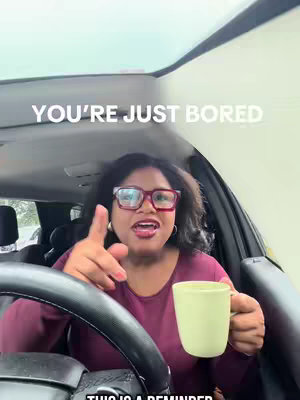 A woman in a car interior, pointing towards the viewer with a cup in her hand. Text overlays the image.