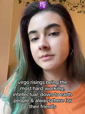 A young woman with green-tinted hair and an orange shirt looks directly at the camera. Text in a casual font overlays the lower portion of the image. Above her head is a purple Virgo symbol.