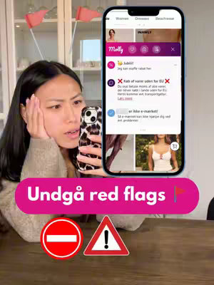 A young woman with dark hair is looking at her phone with a concerned expression. The phone screen displays a shopping app with red flags warnings. Below her is a banner with the text: Undgå red flags, alongside a stop sign, and a warning triangle.