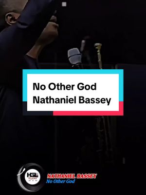 The cover image features a performer holding a microphone, with overlayed text indicating the song title and artist. The color scheme includes red, white, and blue, and appears to be a live performance.