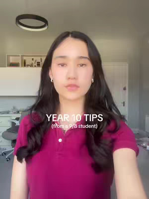 A young woman with long dark hair and a maroon polo shirt looks directly at the camera. Text overlayed on her chest reads 'YEAR 10 TIPS (from a 9/8 student)'. The background appears to be inside a home with neutral-colored walls and a frosted glass door visible.