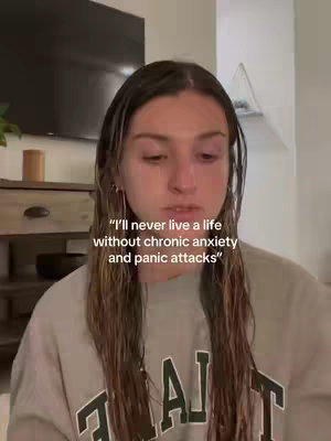 The cover image features a young woman in a close-up shot. She is looking directly at the camera with a slightly sorrowful expression, her hair slightly wet and falling around her face. The background is a blurred interior space, with a television visible and a muted color palette. Text is overlaid on the image, presenting a quote.