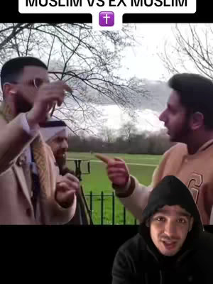 The cover image is a split-screen. The top half shows a scene of two men in an outdoor setting, gesturing towards each other, implying a heated discussion. The bottom half shows a younger man in a black hoodie in a selfie-style shot, looking directly at the camera. The background behind the top scene features bare trees and a cloudy sky, while the overall composition creates a sense of confrontation and personal commentary.