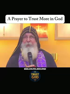 The cover image shows a man with glasses, a long white beard, and a black outfit with purple accents, holding a microphone. Above him is a white banner with black text, and below him is a black banner with "@WELOVEYOU.JESUS.AMEN" and a "TRUST GOD" logo.