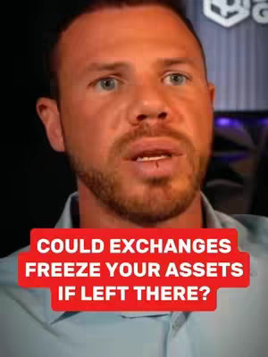 A close-up shot features a fair-skinned man with auburn hair and a beard, looking directly towards the camera with a serious expression. A bright red rectangular text overlay is located at the bottom, contrasting dramatically with the man’s skin and the background. The background is slightly blurred behind the man.