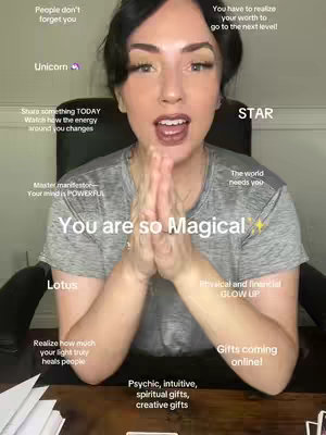 A woman with dark hair and fair skin sits in front of a dark wooden desk, her hands clasped in a prayer-like gesture. Text overlays with inspirational messages surround her. The overall composition is balanced, with a warm lighting.