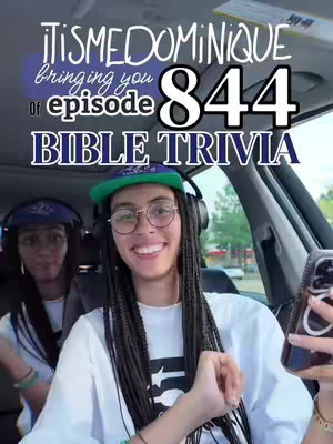 A selfie-style image taken from inside a car. Two people are visible, with the main subject in the foreground smiling at the camera. The person in front is wearing headphones, glasses and a baseball cap. Text overlays indicate an episode number and the topic of 'Bible Trivia'. The background is a blurred view of the outside world.