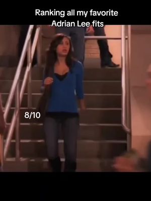 The image shows the creator in a scene from the TV show "Secret Life of an American Teenager". A woman walks down a flight of stairs. In the top left corner, there is text overlaid on the image.  At the bottom left corner there is text overlaid on the image that says "8/10".