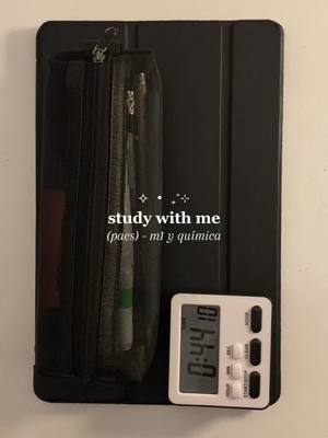 A still life setup on a light-colored surface, featuring a black iPad case with a transparent pencil case attached, a white timer, and text overlayed in white.