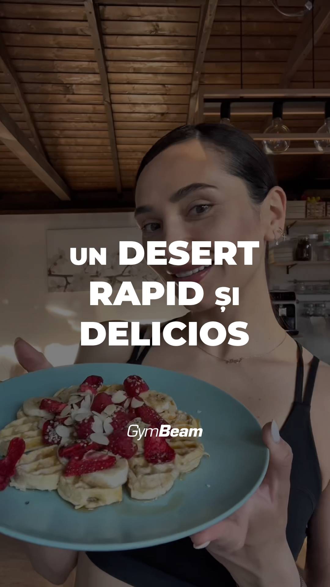 A woman holds a plate of waffles topped with banana slices, strawberries, and almonds. The photo is vertical, with the woman's face and upper body in the frame, and white text reading 'UN DESERT RAPID SI DELICIOS' overlaid on the image. The background appears to be a wood ceiling.