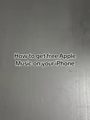 A vertical image with a plain gray background. In the center, white text reads: "How to get free Apple Music on your iPhone". The text is in a sans-serif font.