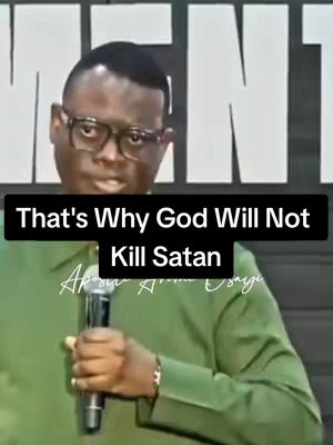 A man wearing glasses and a green shirt is standing in front of a blurred background. The image has a text overlay in the bottom black rectangle and the name of the person in a white script at the bottom.