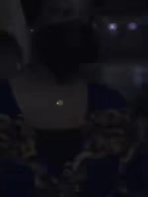 The cover image is a dark, almost entirely black, image. There is a person or figure in the image, the details are lost in the darkness.