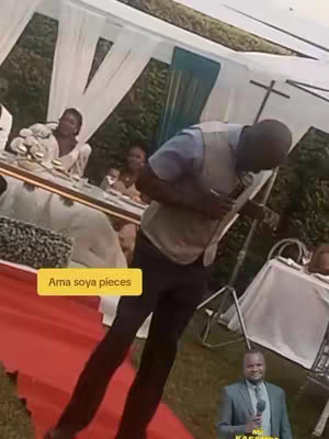 A man is speaking into a microphone while standing on a red carpet. He is wearing a vest, light blue shirt, and dark pants. Behind him, guests are seated at tables, and the scene is set up as though it could be a wedding reception. To the right is a small image of a man with a microphone.